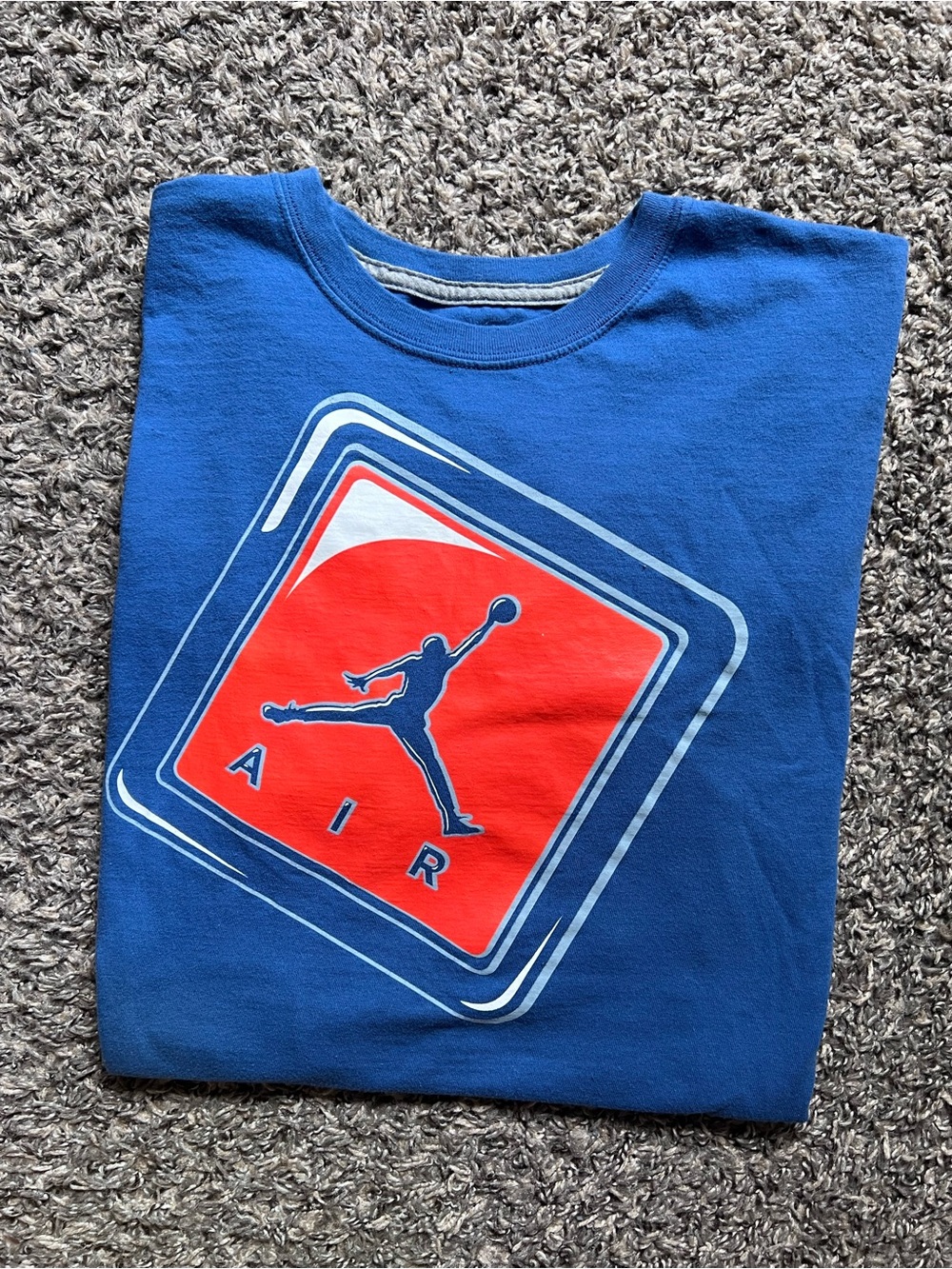 Nike Blue Short Sleeve T-Shirt with orange& White Jump Graphic